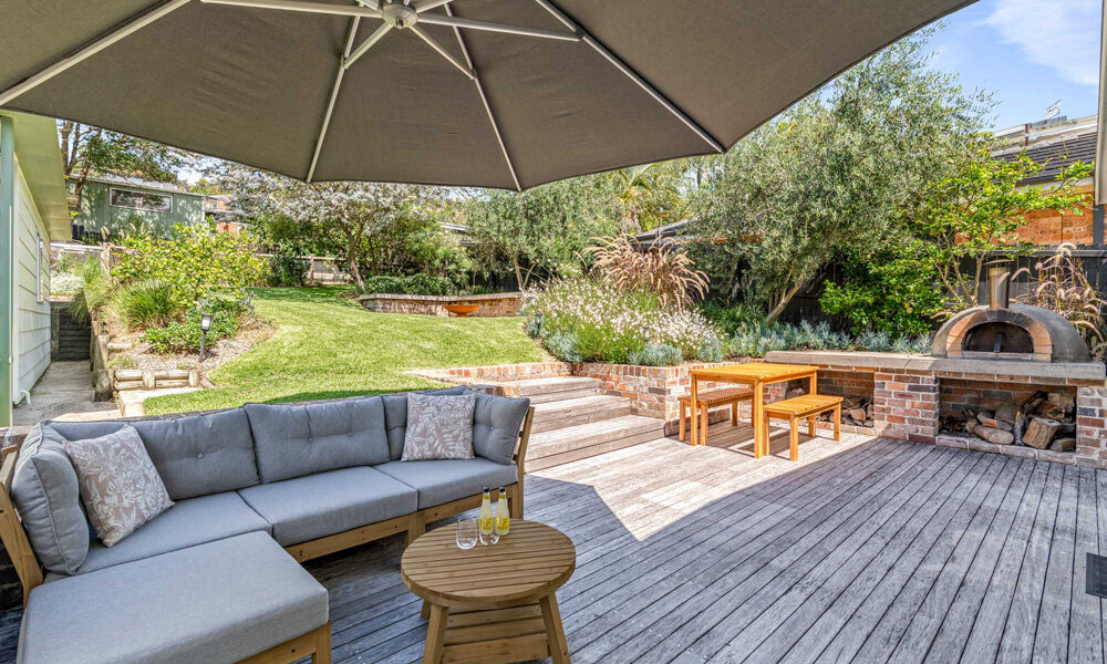 outdoor entertaining-deck-sea-breeze-forresters-beach-holiday-accom-coast-hosting - feature