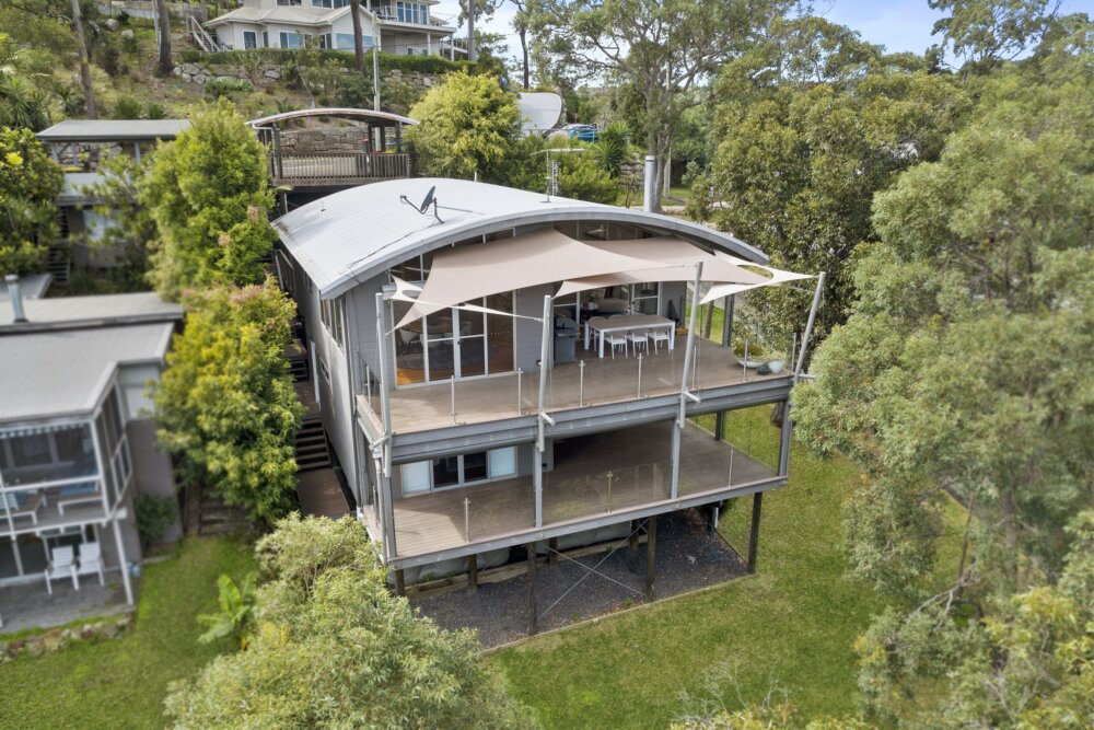 Serene, a luxury 4-bed waterfront home in Point Clare with pool, spa, boat ramp & stunning views. Sleeps 10. The ultimate Central Coast escape. Book now!